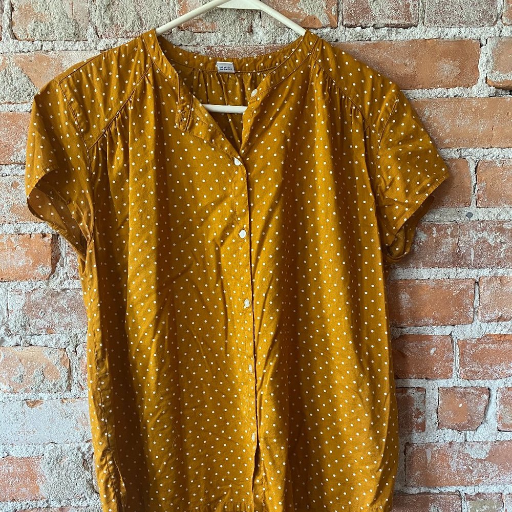 Orange and white polka dot blouse